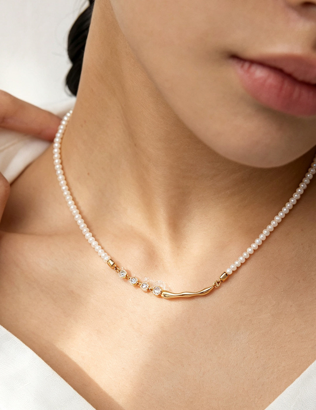 Fluid Silver Necklace worn by a model