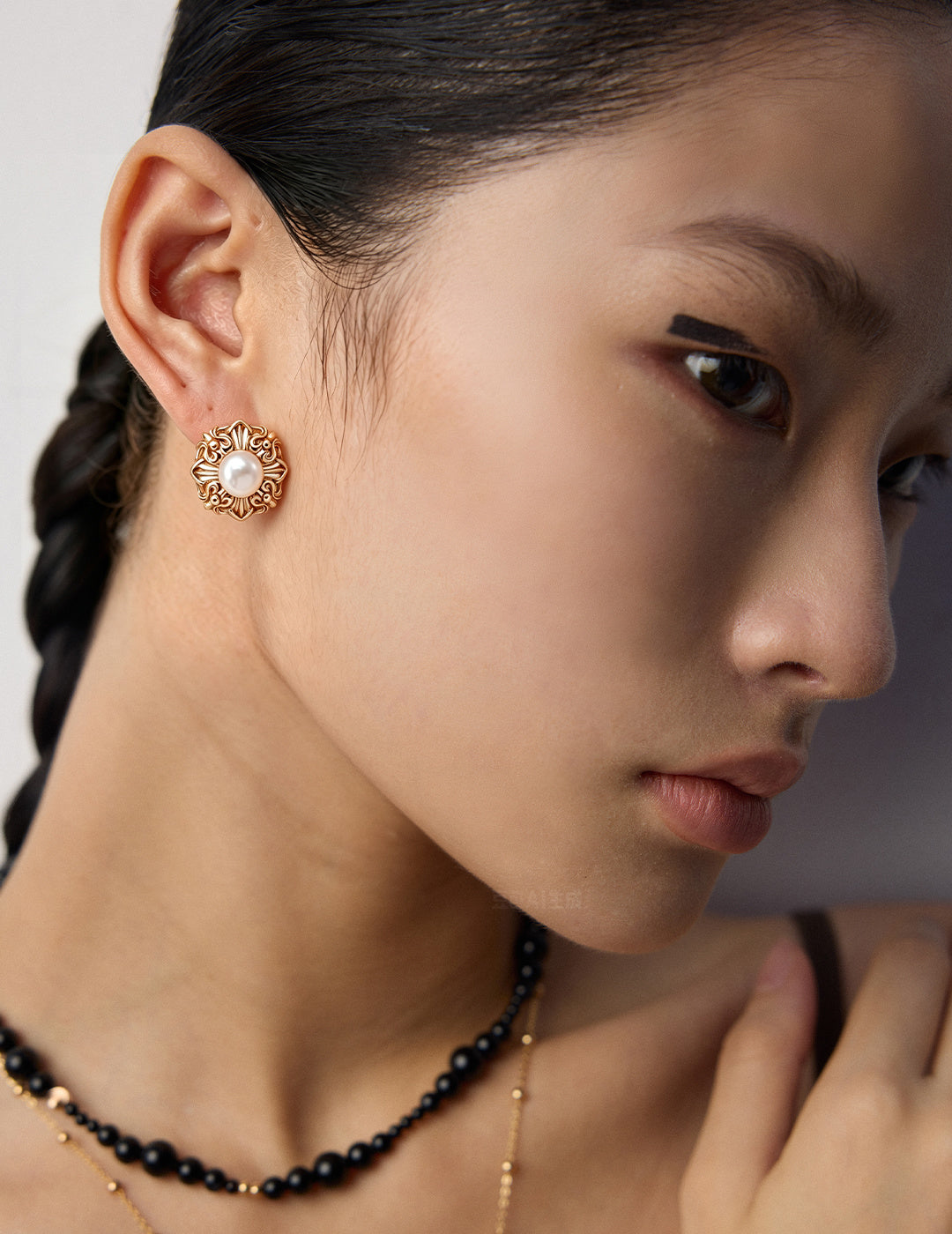 Rococo Pearl Silver Earrings worn by a model