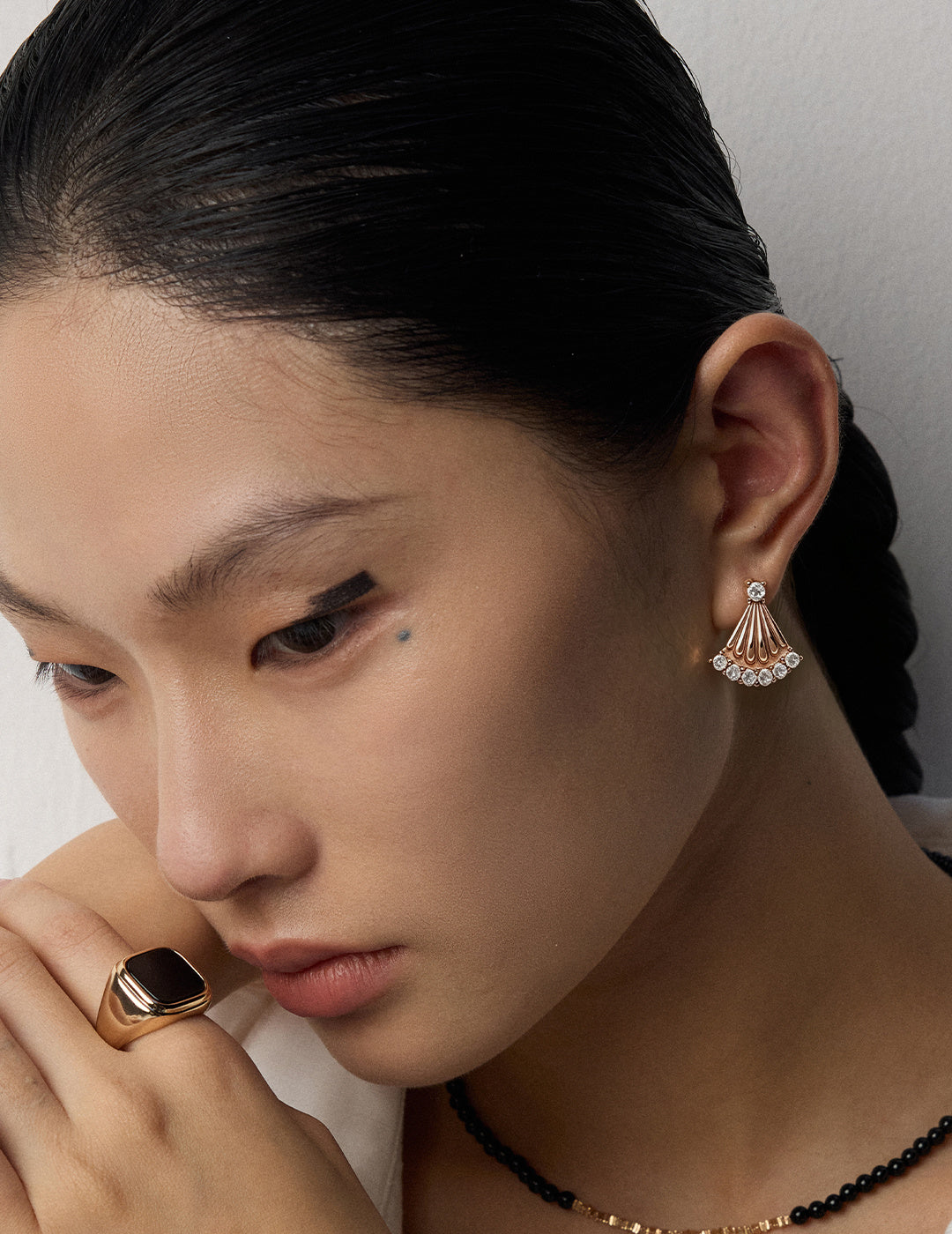 Art Deco Fan Silver Earrings worn by a model