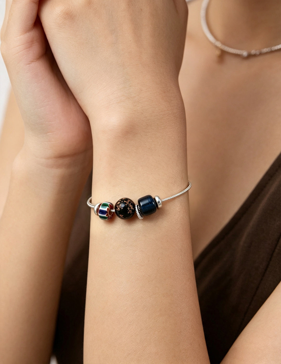 Nepal Artisan Glass Silver Bracelet worn by a model