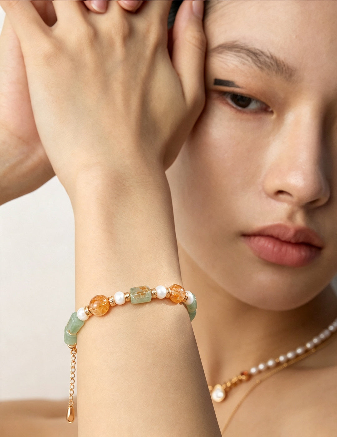 Green Gemstone & Pearl Bracelet worn by a model