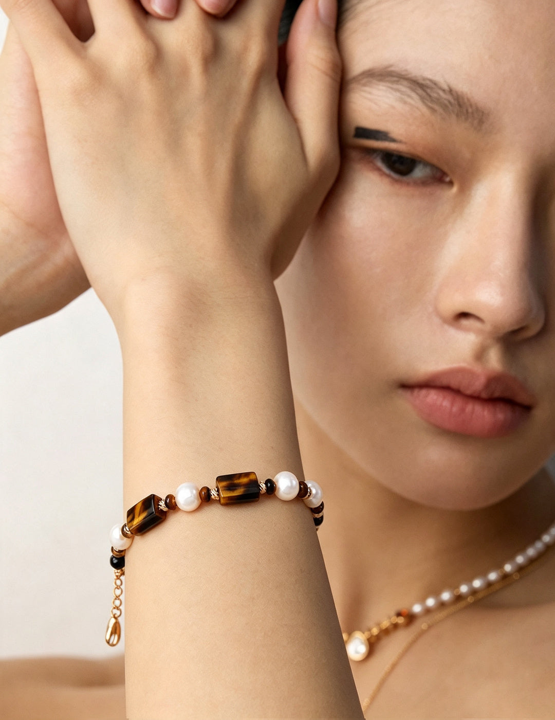 Caramel Tiger's Eye & Pearl Bracelet worn by a model